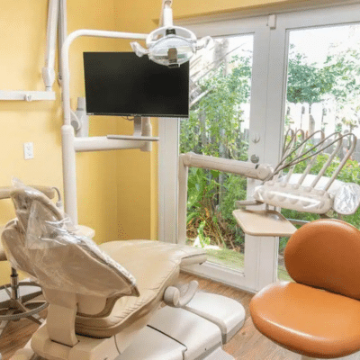 Empty dental chair looking outside, representing dental membership plan
